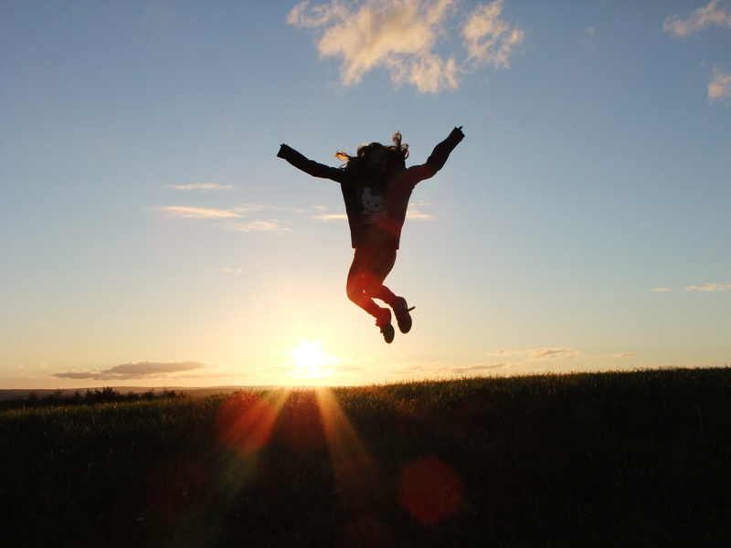 Person Doing a Jumpshot at Sunset